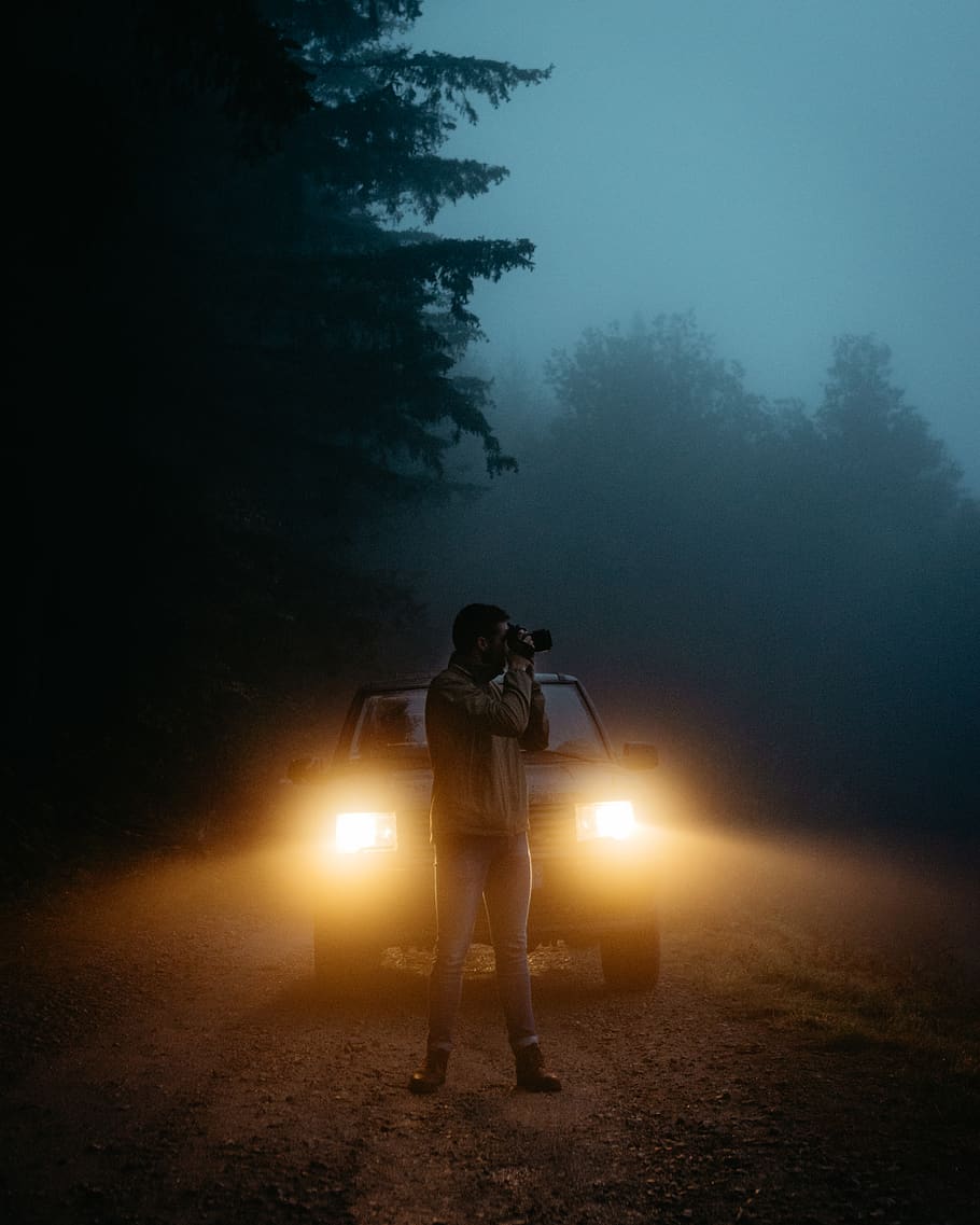 Man Taking Photo in Front of Vehicle, adventure, camera, car HD wallpaper