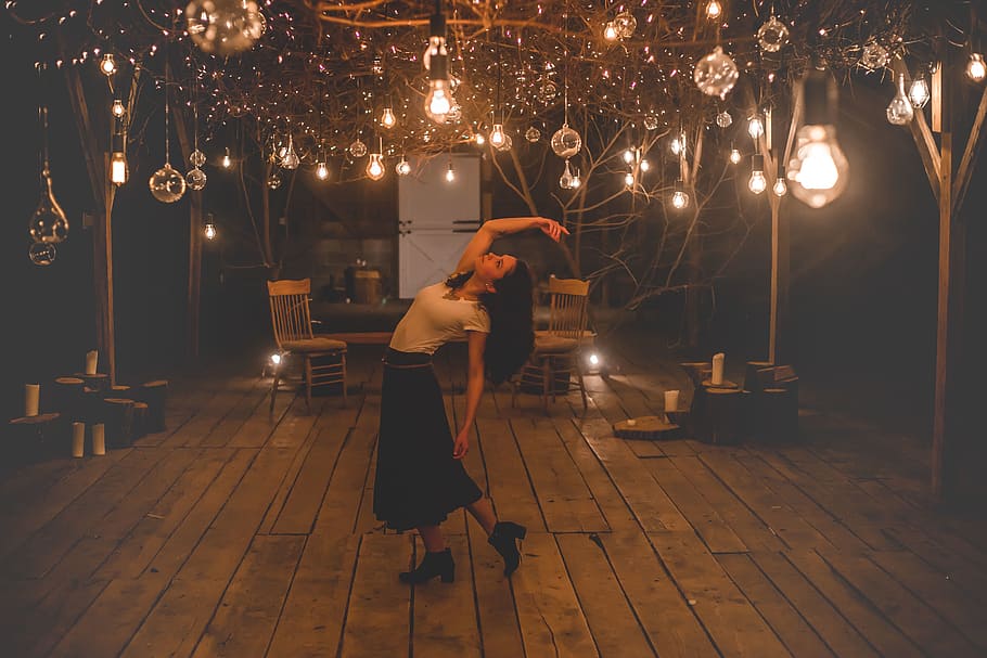 Woman Dancing on Terrace With Lights Turned-on, blurred background HD wallpaper