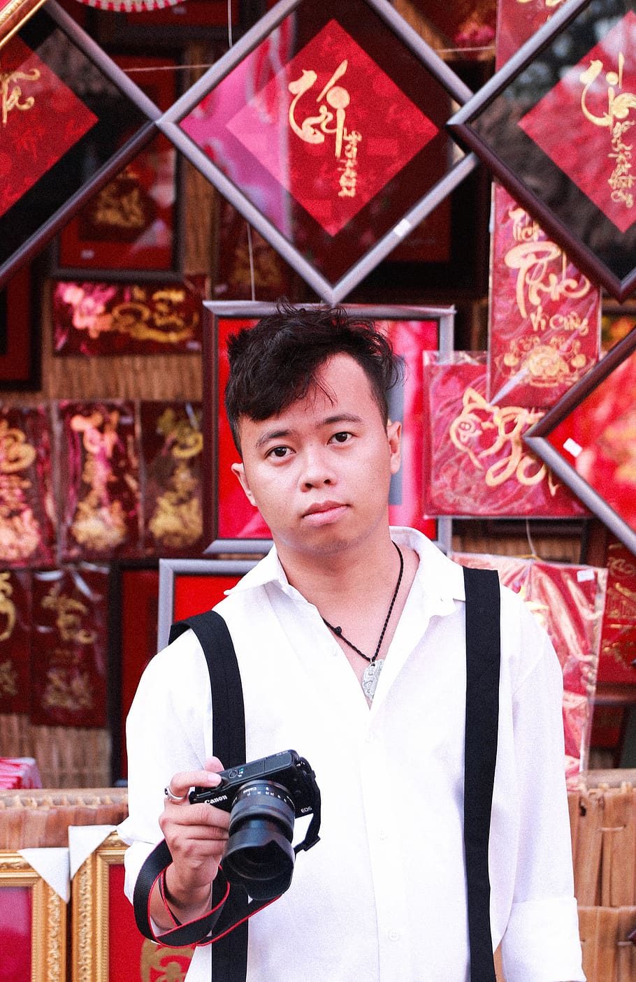man holding black DSLR camera, human, person, clothing, apparel HD wallpaper