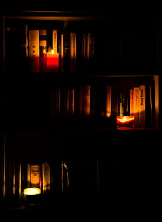 candles, lights, fire, books, bookcase, warm, cozy, dark, night HD wallpaper
