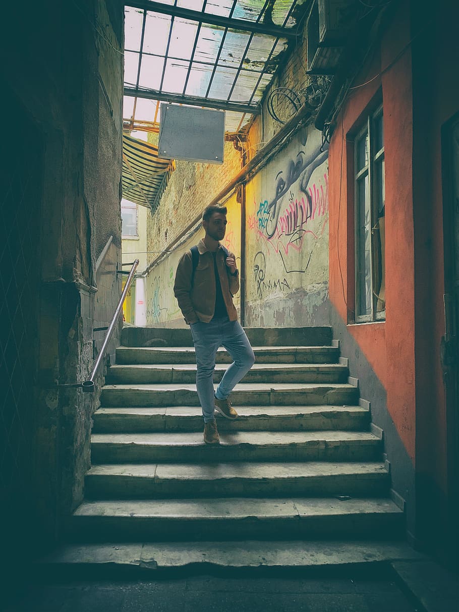 man walking down the stairs, banister, handrail, human, person HD wallpaper