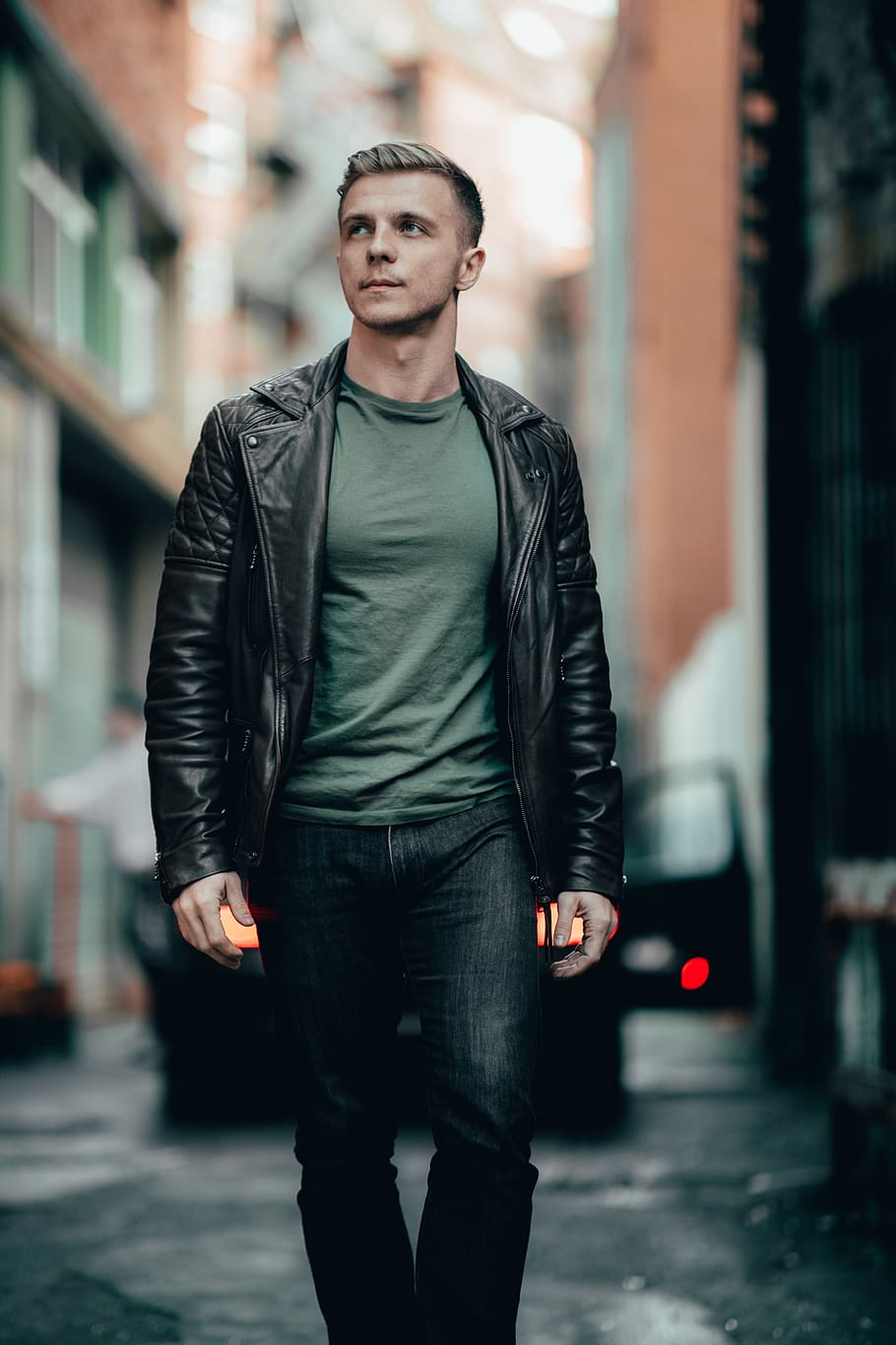 man wearing black leather jacket, focus on foreground, one person HD wallpaper