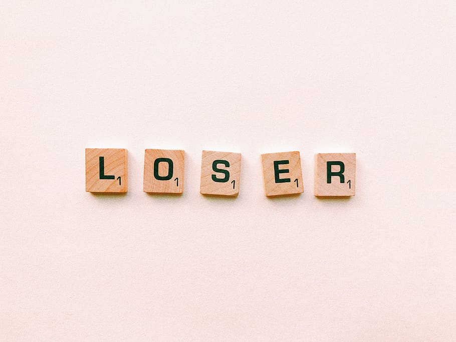 Closeup Photography of Loser Scrabble Letter, alphabet, conceptual