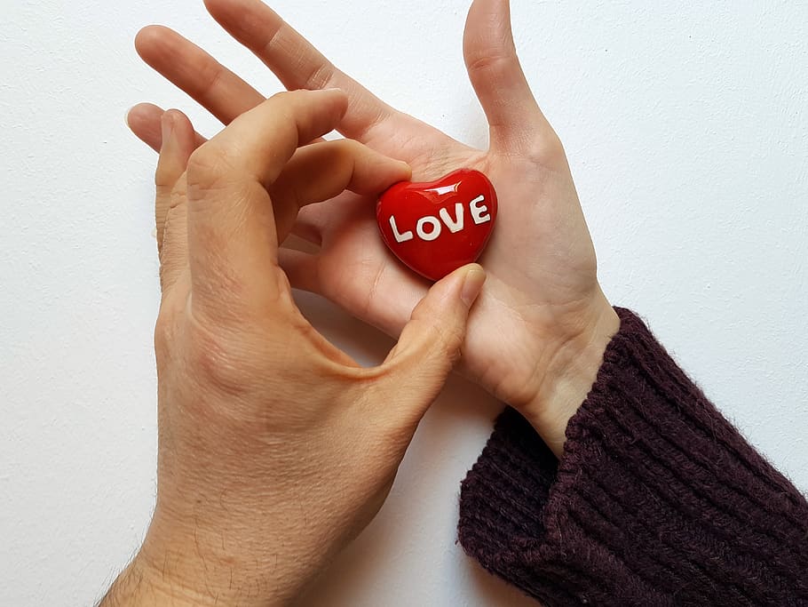 Red Love Heart Ornament, background, hands, human, indoors, shape HD wallpaper