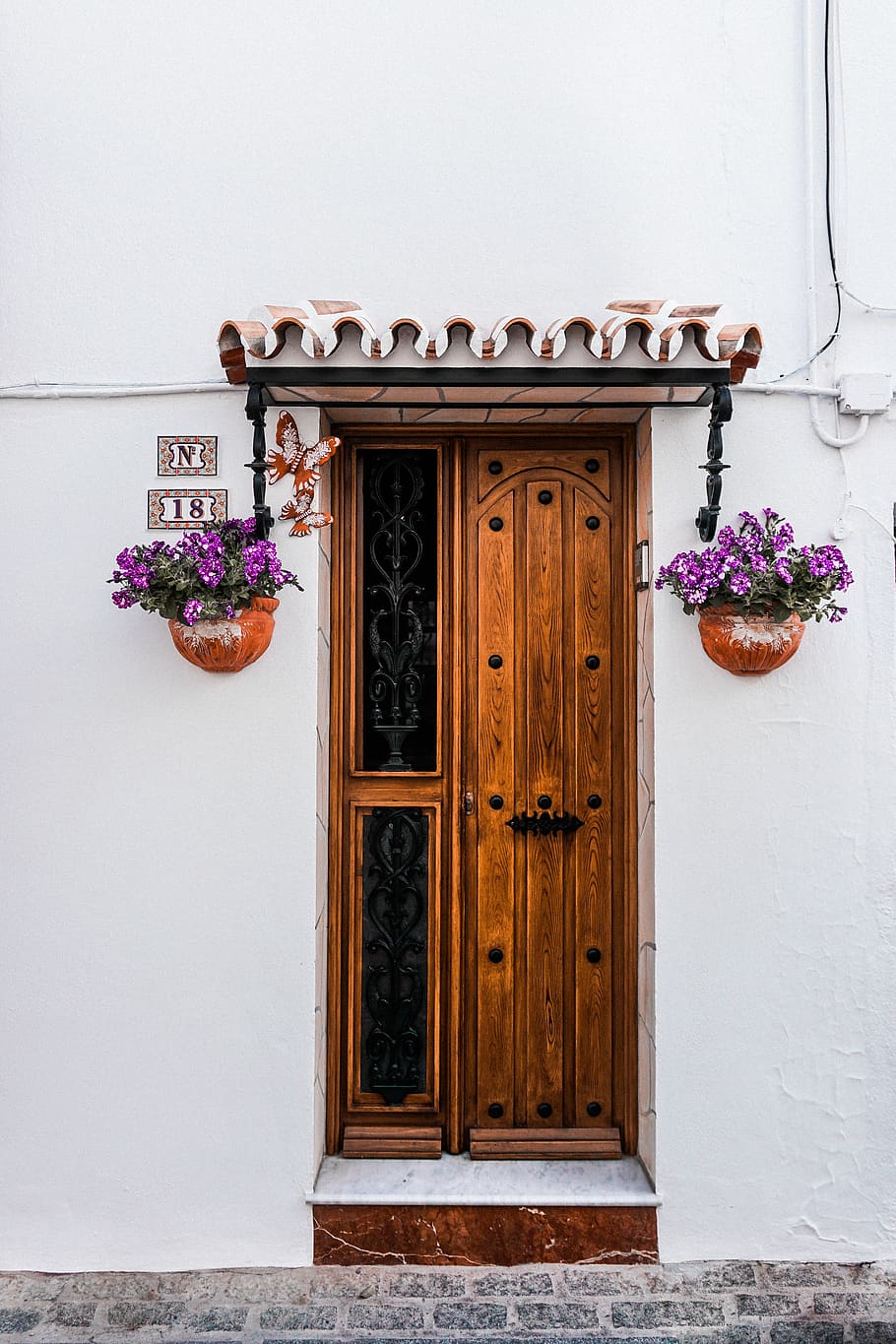 Brown Wooden Door Beside Two Purple Petaled Flowers, architecture HD wallpaper