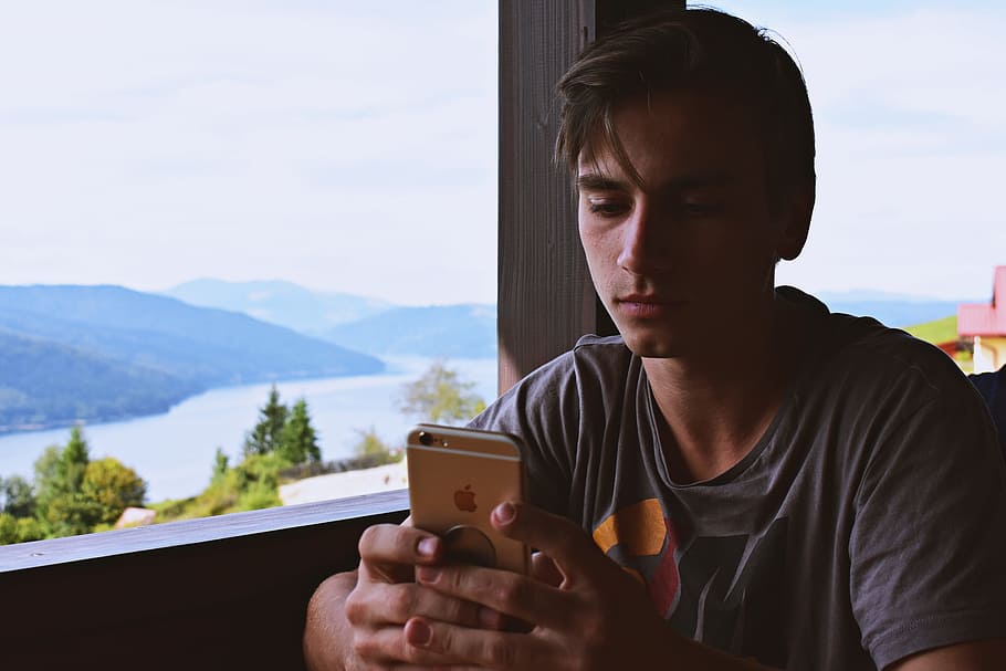 Man Holding Gold Iphone 6, daylight, facial expression, hands HD wallpaper
