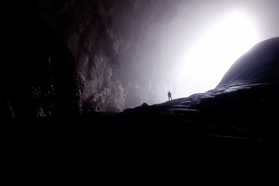 nature, cave, underground, shadows, light, rays, guy, man, male HD wallpaper