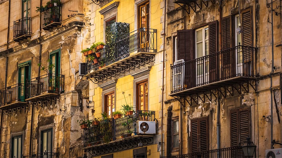 house facade, balconies, shutters, ailing charm, architecture