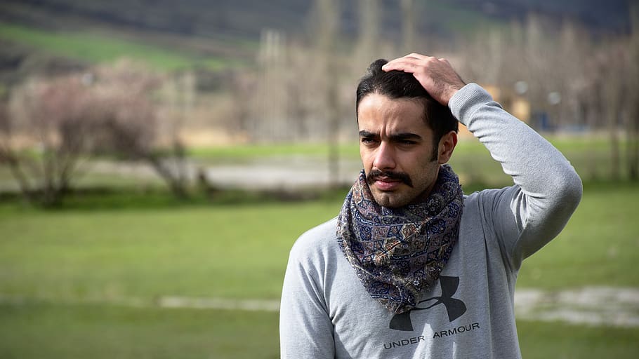 man standing touching head, clothing, apparel, scarf, person HD wallpaper