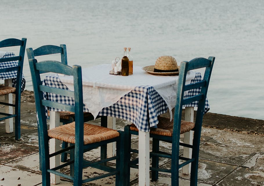 brown sun hat on top of table near calm water, chair, coast, shore HD wallpaper