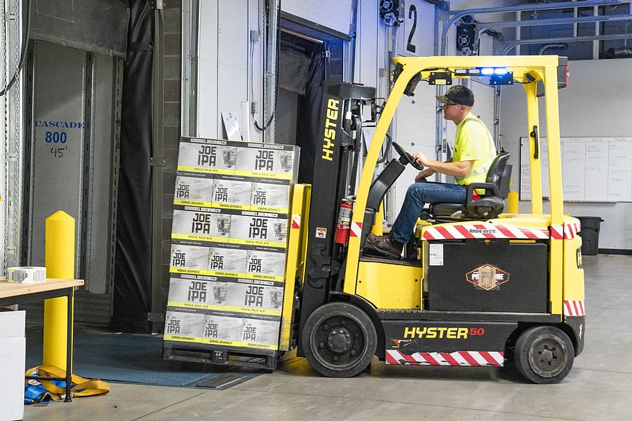 Man Riding a Yellow Forklift With Boxes, company, driver, factory, HD wallpaper