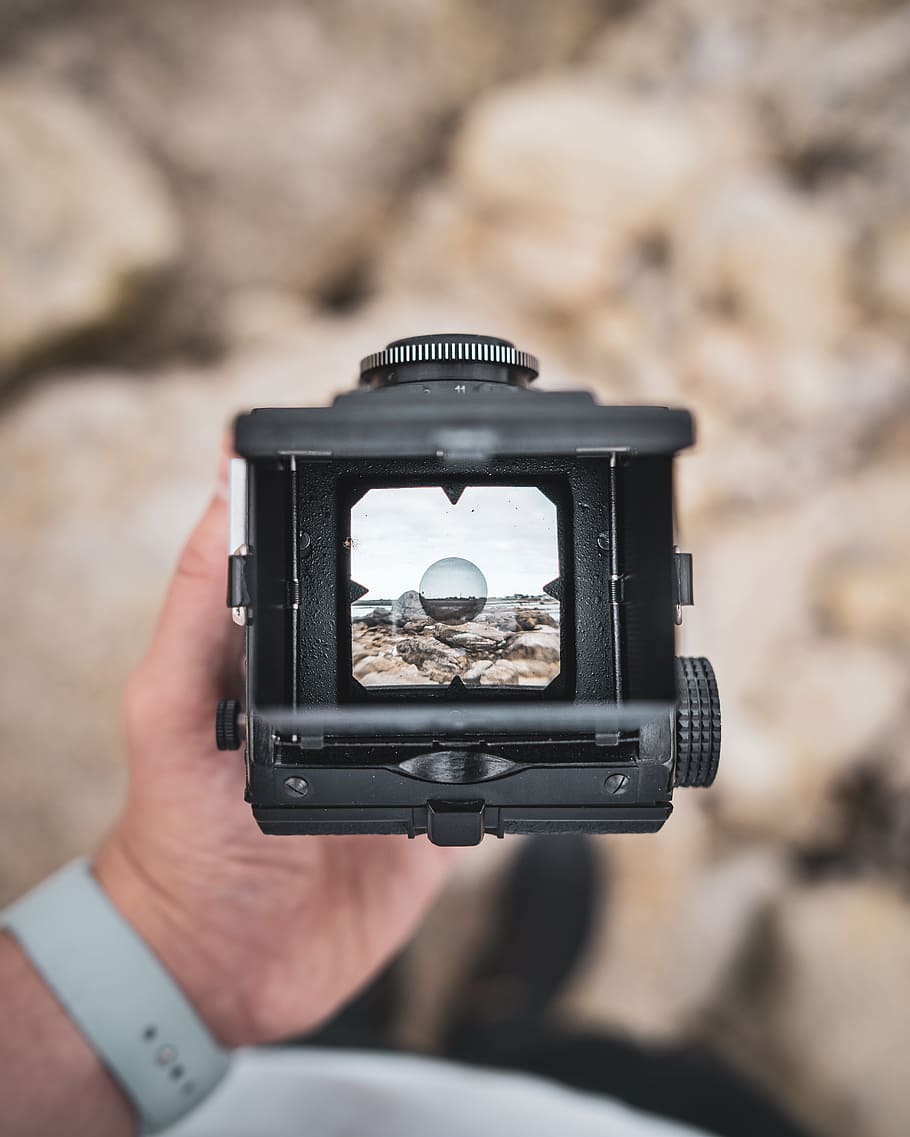 person holding black camera, viewfinder, bokeh, blur, britany HD wallpaper