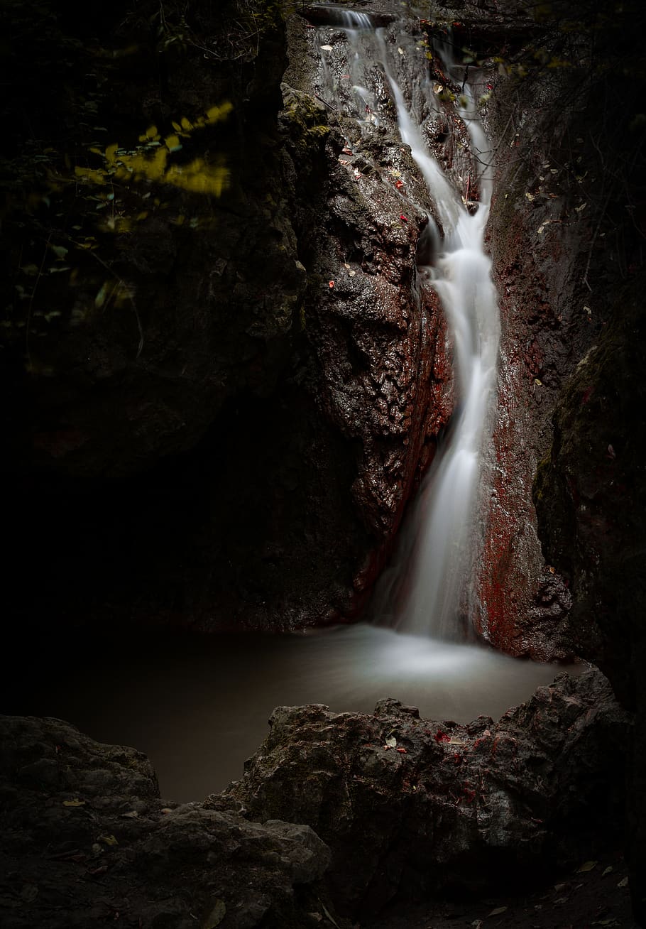 waterfalls between rock formation, nature, cave, outdoors, sea life HD wallpaper