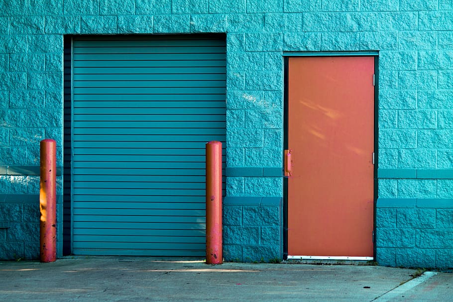 Brown Panel Door Near Roll-up Gate, blue, bricks, exterior, outdoors, HD wallpaper