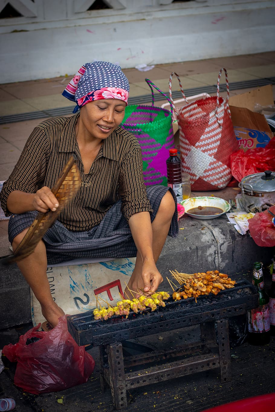 woman making barbecue, apparel, clothing, human, person, indonesia