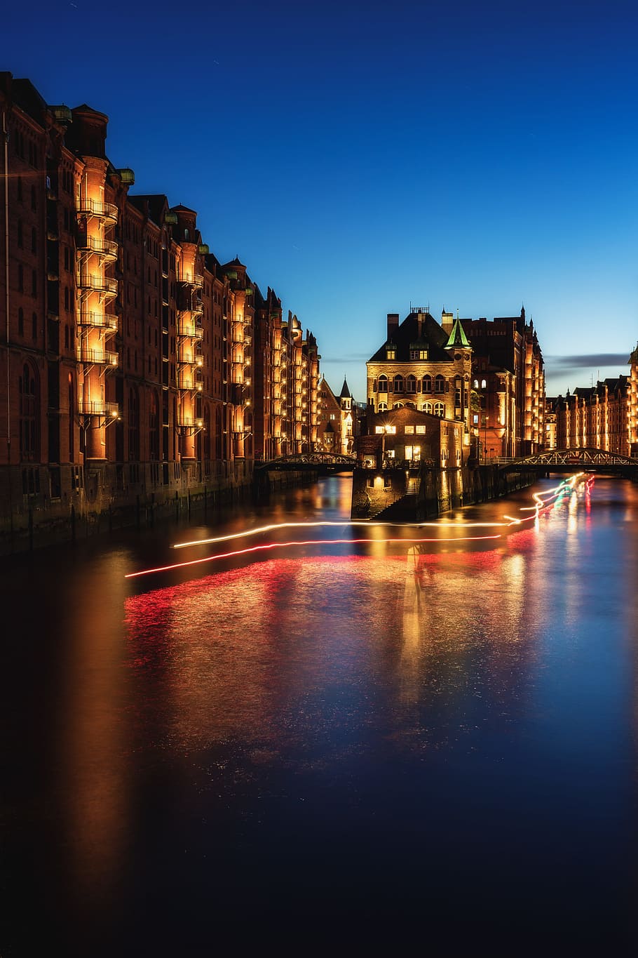 beige painted building scenery, city, night, light, orange, canal HD wallpaper