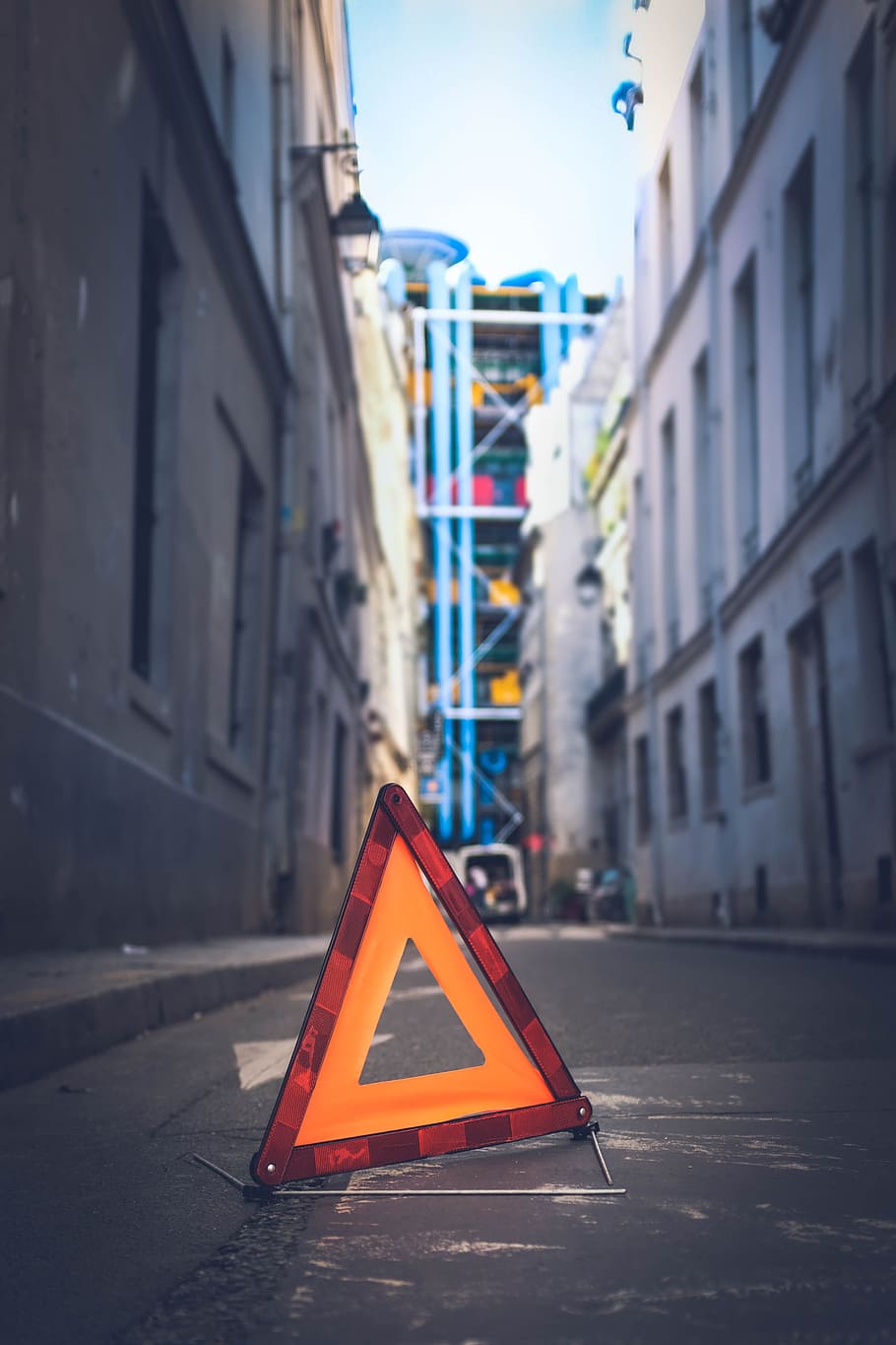 orange early warning device on the alley, triangle, traffic, neon HD wallpaper