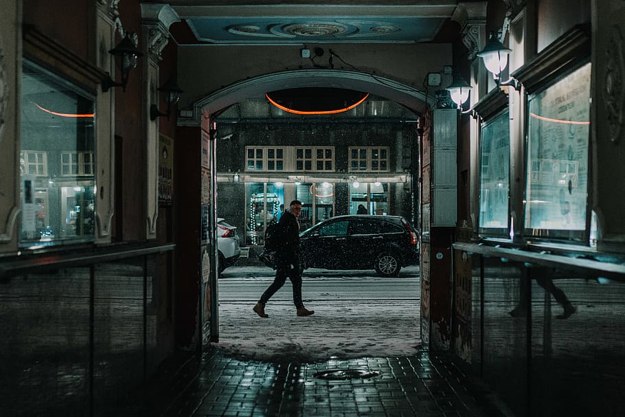 man walking beside building, person, human, pedestrian, vehicle HD wallpaper