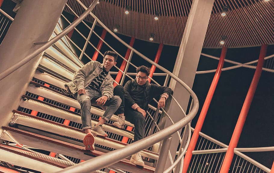 Two Men Sitting on Spiral Stairway, architecture, building, ceiling HD wallpaper