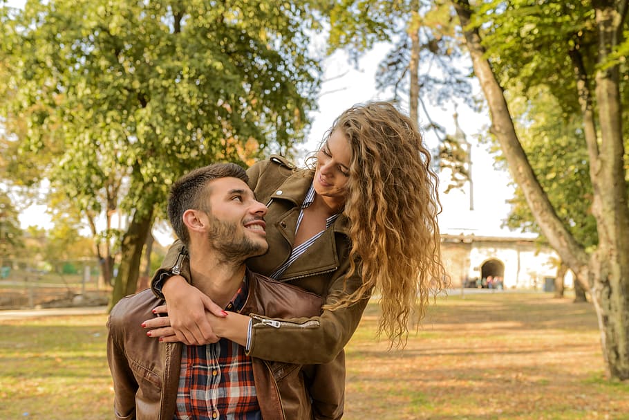 Man and Woman Wearing Wearing Brown Leather Jacket Near Green Leaf Tree HD wallpaper