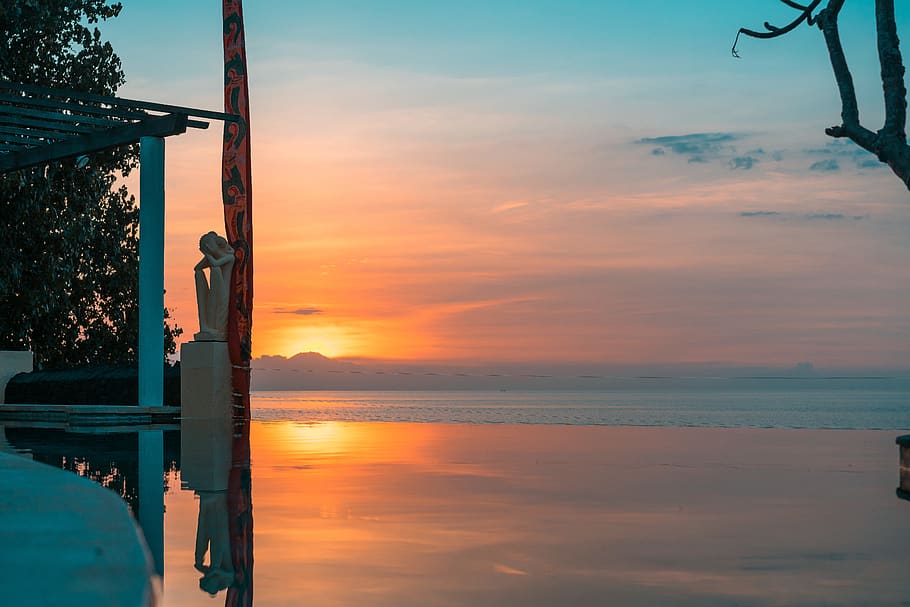 Body Of Water With Sunset Behind, backlit, bali, dawn, infinity pool HD wallpaper