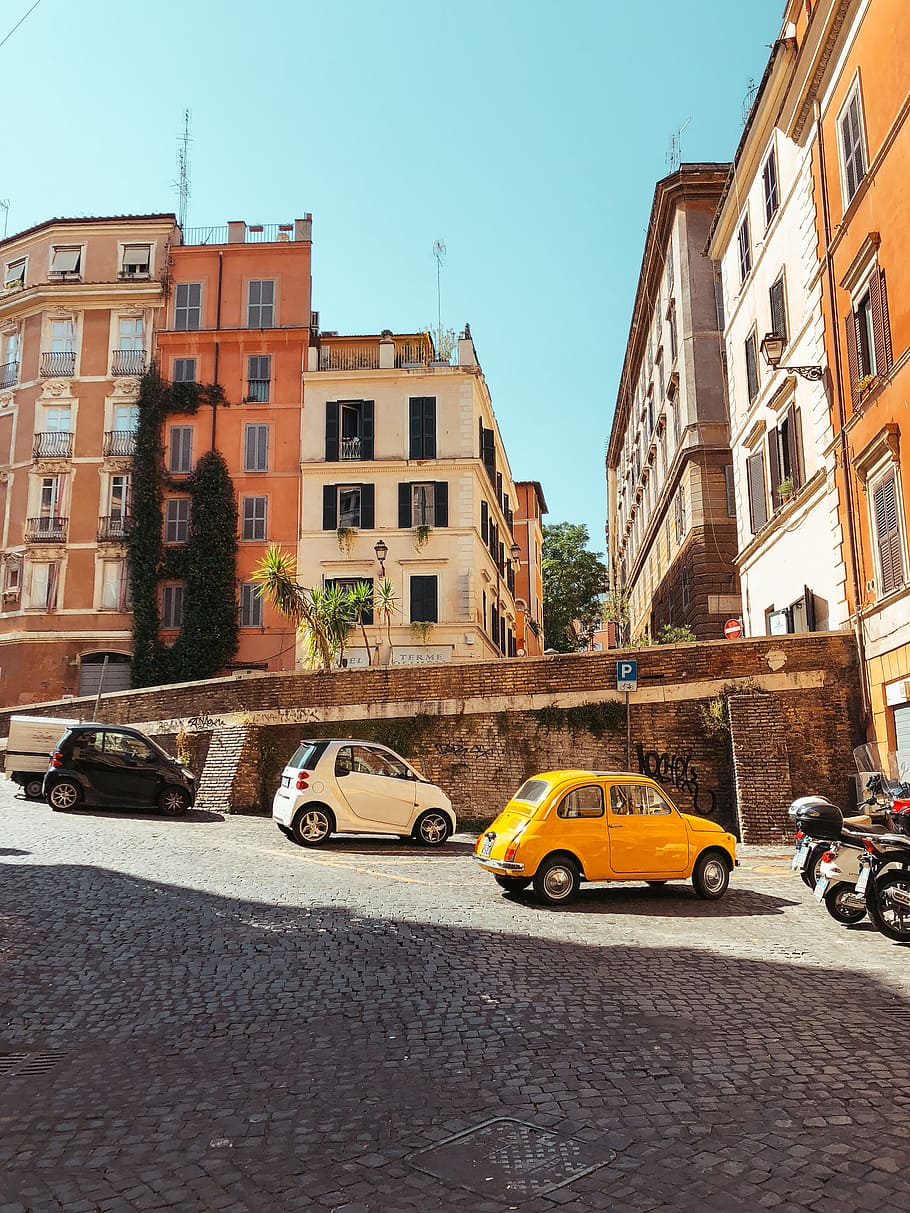 yellow mini cooper in front of building, window, car, smart car HD wallpaper
