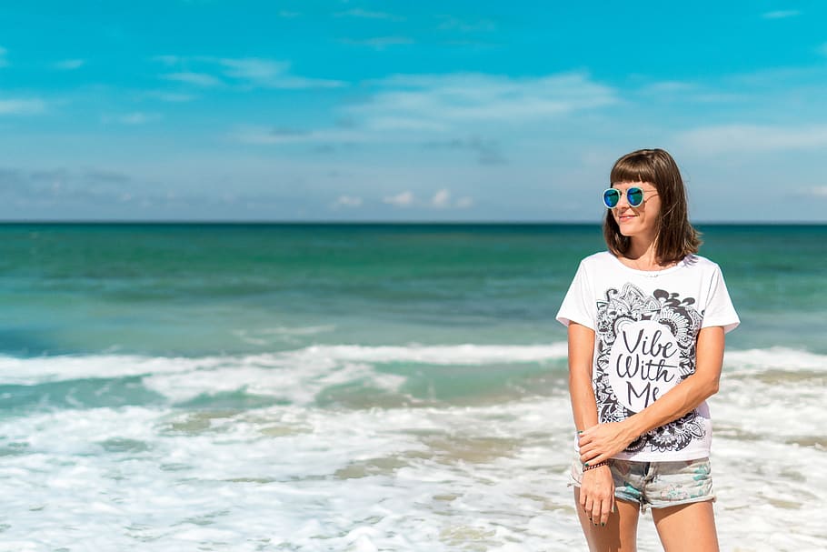 Woman in White Crew-neck Shirt Near Sea Shore, beach, beautiful HD wallpaper