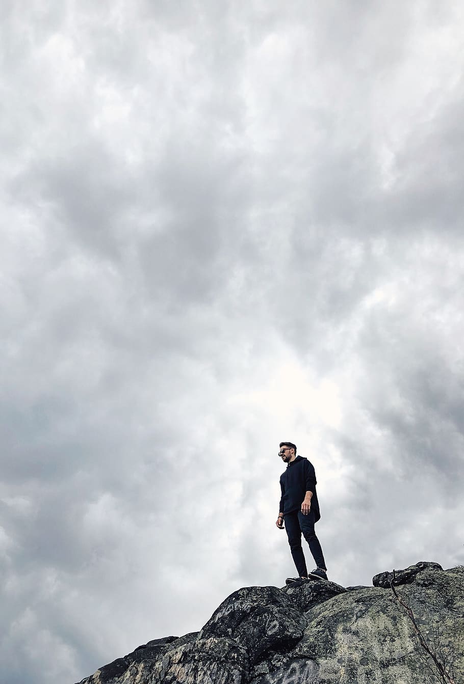 man standing on cliff, nature, person, human, outdoors, sky, weather HD wallpaper