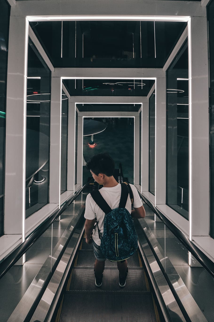 man riding escalator, person, human, people, grey, electrical device HD wallpaper