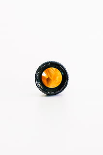 black camera lens, electronics, orange, flower, leaves, cameralens HD wallpaper