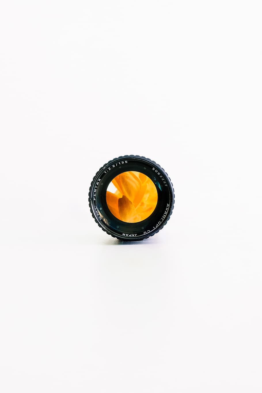 black camera lens, electronics, orange, flower, leaves, cameralens HD wallpaper