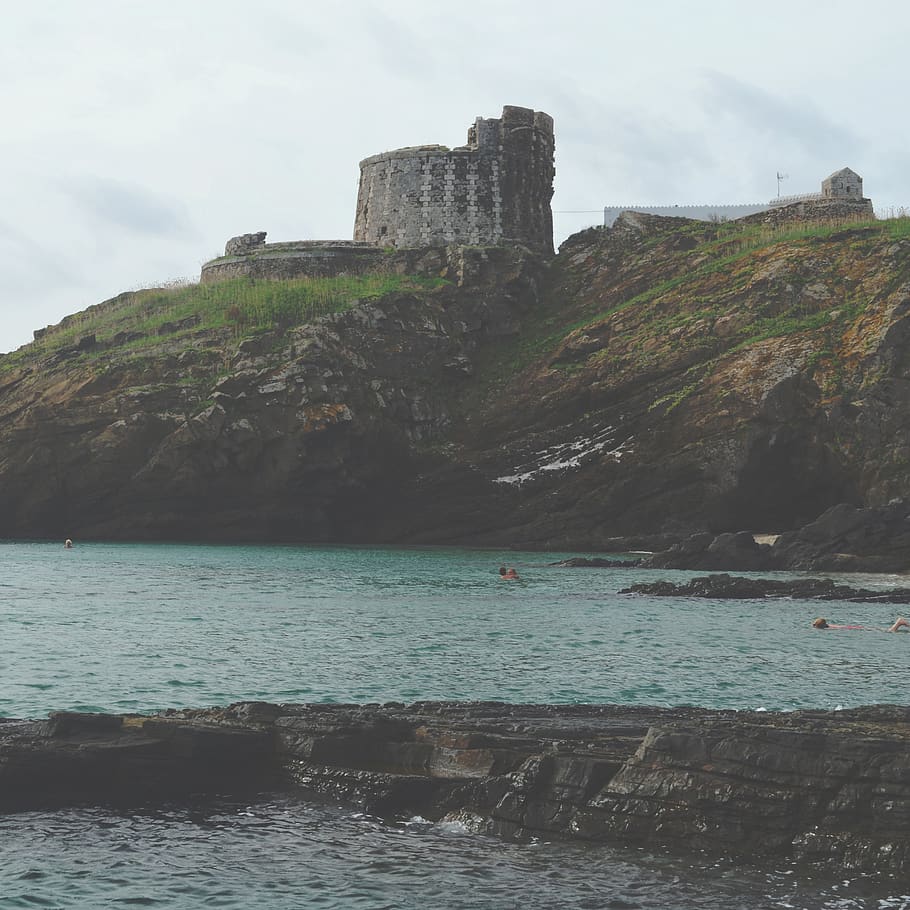 sea, rocks, tower, water, sky, beauty in nature, scenics - nature HD wallpaper
