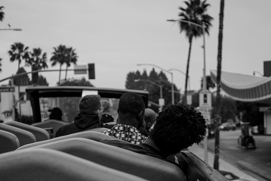 Man Riding Vehicle Grayscale Photo, black-and-white, city, crowd