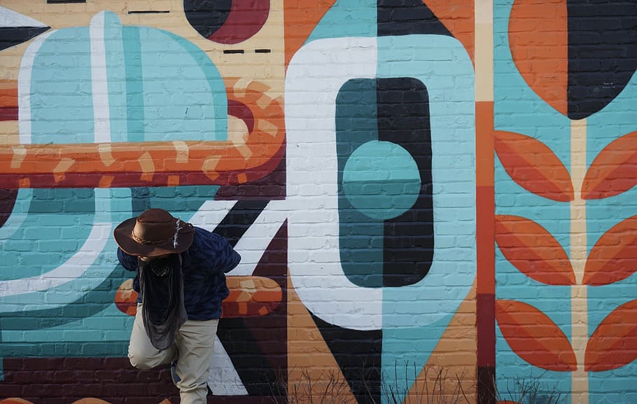 person standing behind wall, wall - building feature, one person HD wallpaper