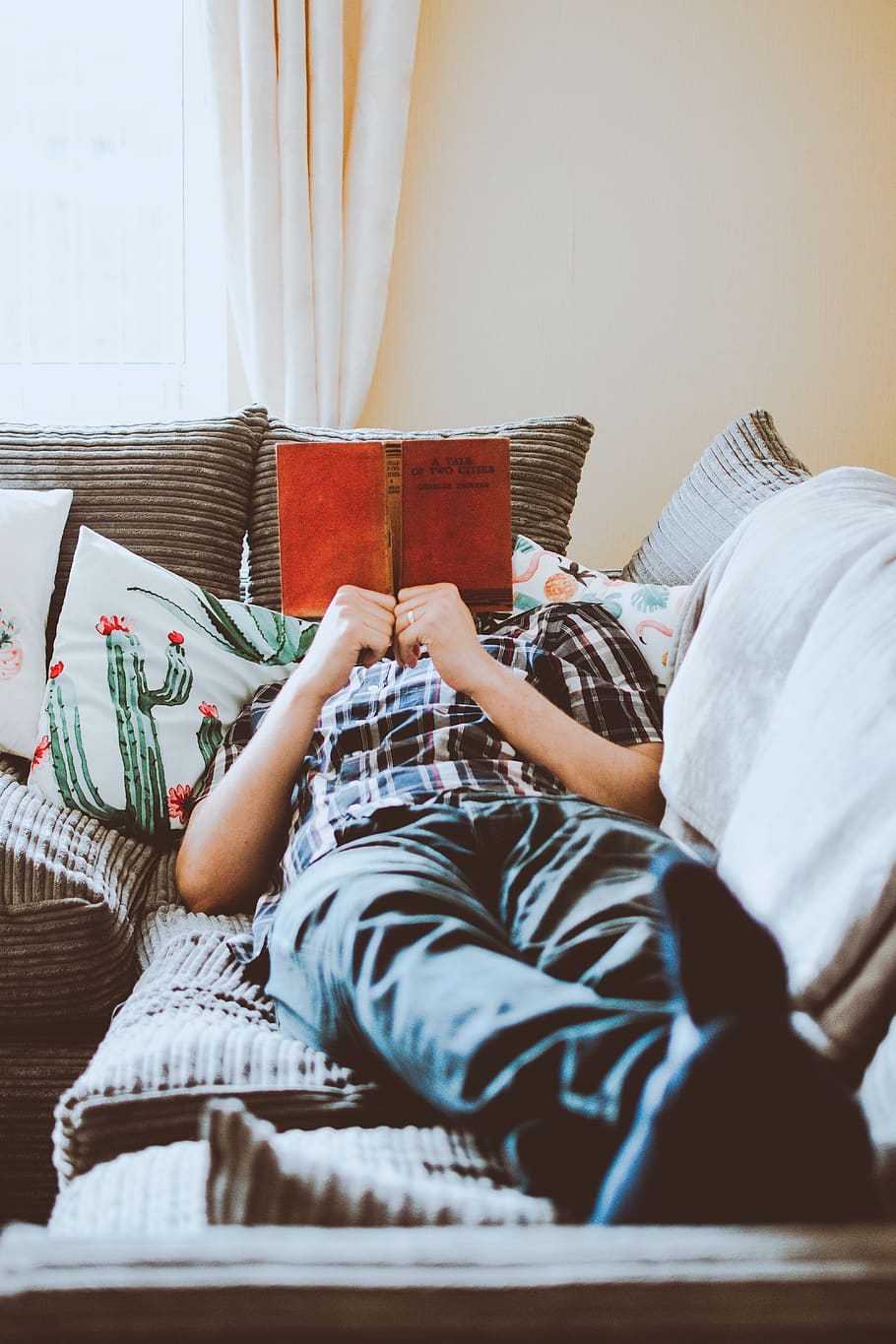 Photo of Man Lying on Bed While Reading Book, chill, comfort