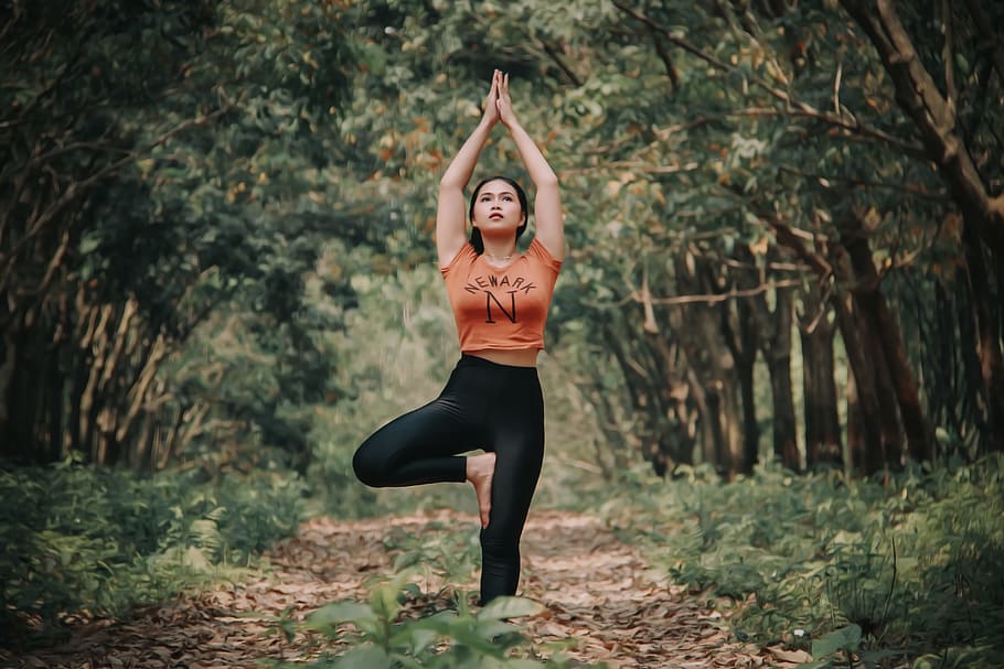 woman doing yoga near trees, person, pose, standing, outdoor