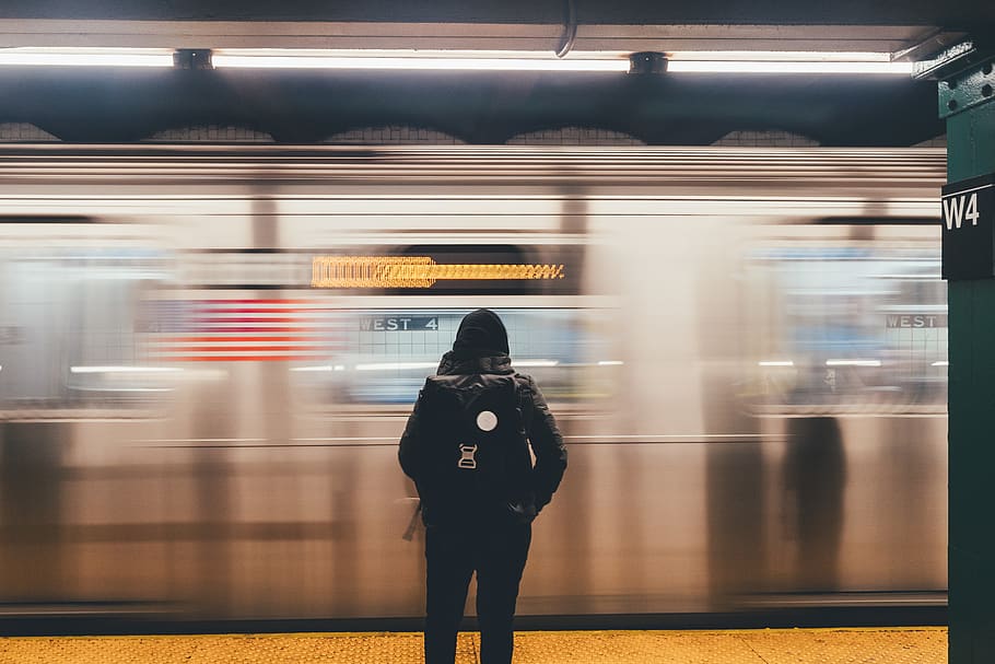 person standing inside terminal, blurred motion, public transportation HD wallpaper