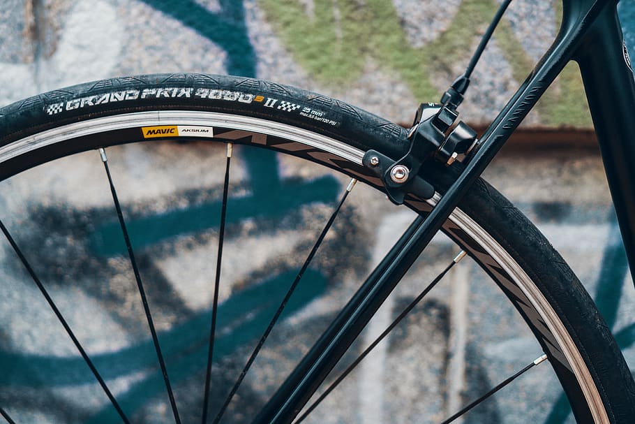 black bicycle wheel, transportation, mode of transportation, focus on foreground HD wallpaper