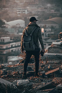 Photo of Man Holding Camera, back, back view, backpack, blur HD wallpaper