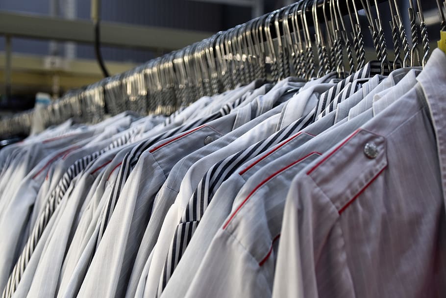 assorted clothes hanging, coathanger, in a row, clothes rack HD wallpaper
