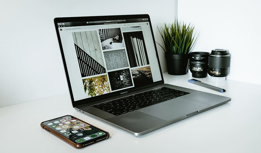 silver laptop computer beside black smartphon, technology, plant HD wallpaper