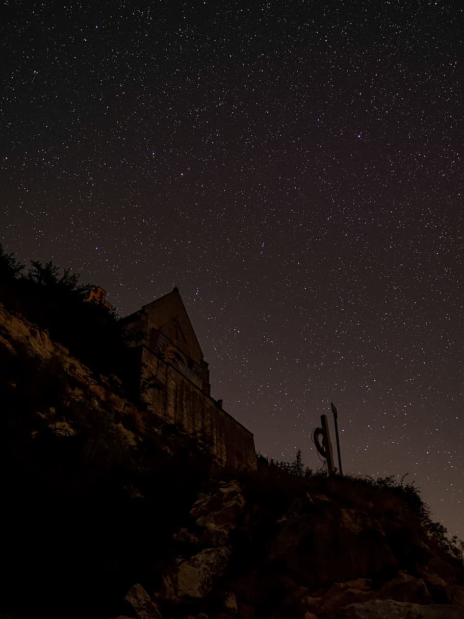 low-angle photography of house under stars, cliff, building, edge, HD wallpaper