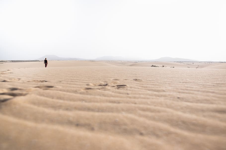 man standing at desert, soil, outdoors, sand, nature, human, person HD wallpaper