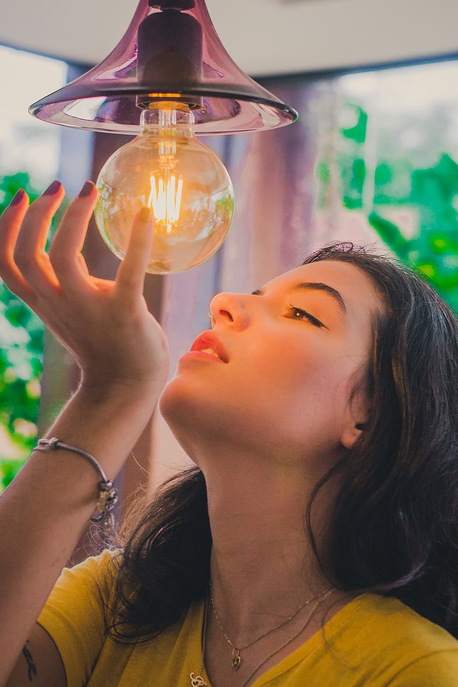 Woman Looking At Light Bulb, illuminated, person, headshot, portrait HD wallpaper