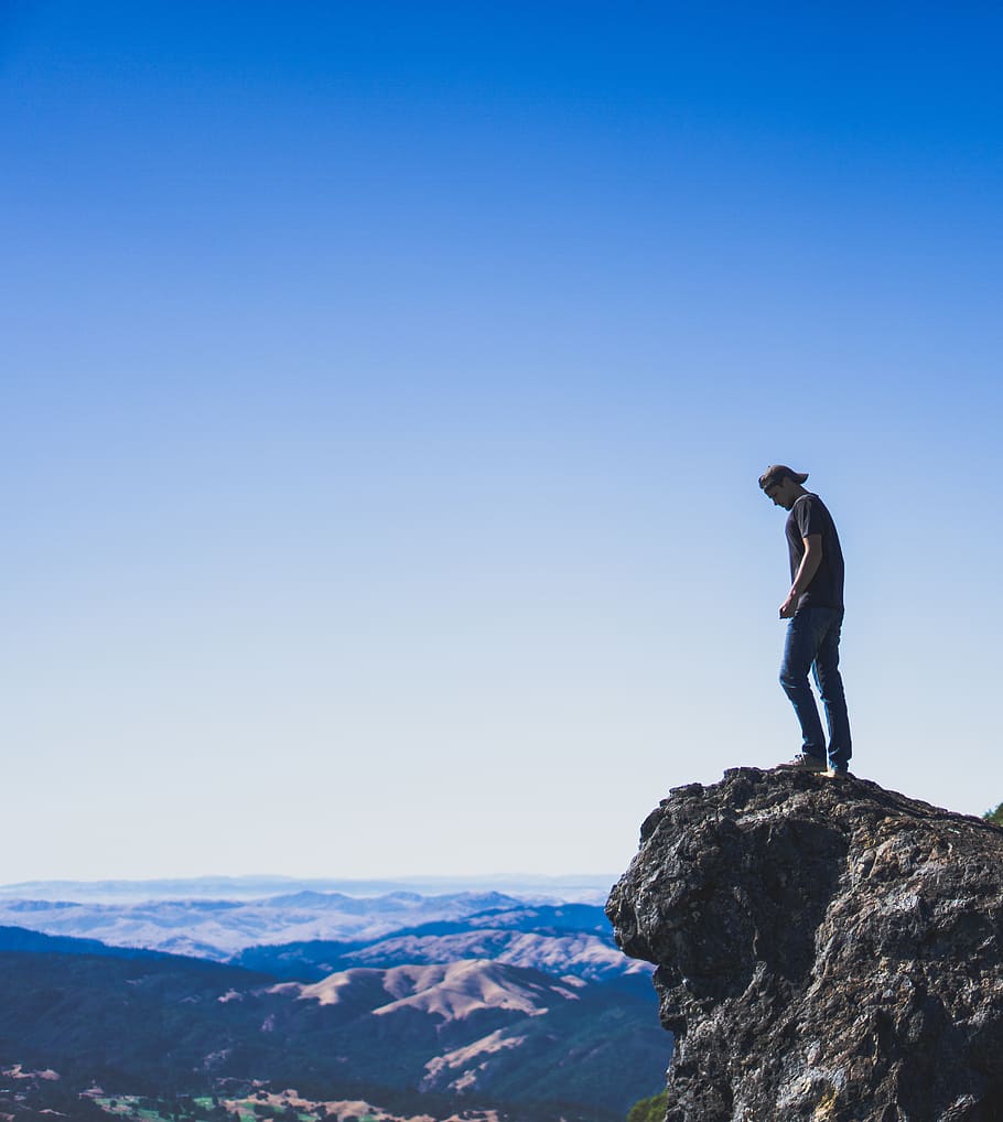 man on cliff, rollinghill, beauty in nature, sky, scenics - nature HD wallpaper