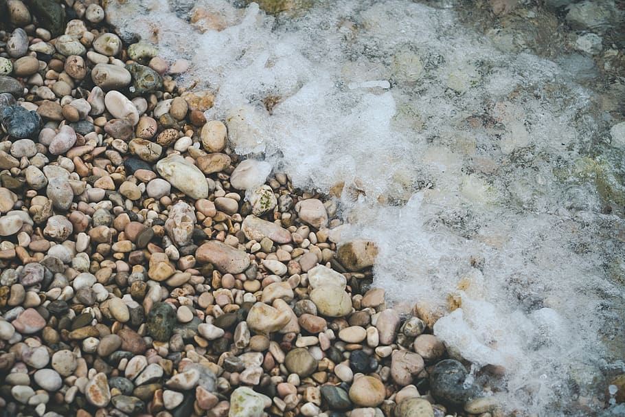 stones, sea, waves, rock, solid, pebble, water, nature, day HD wallpaper