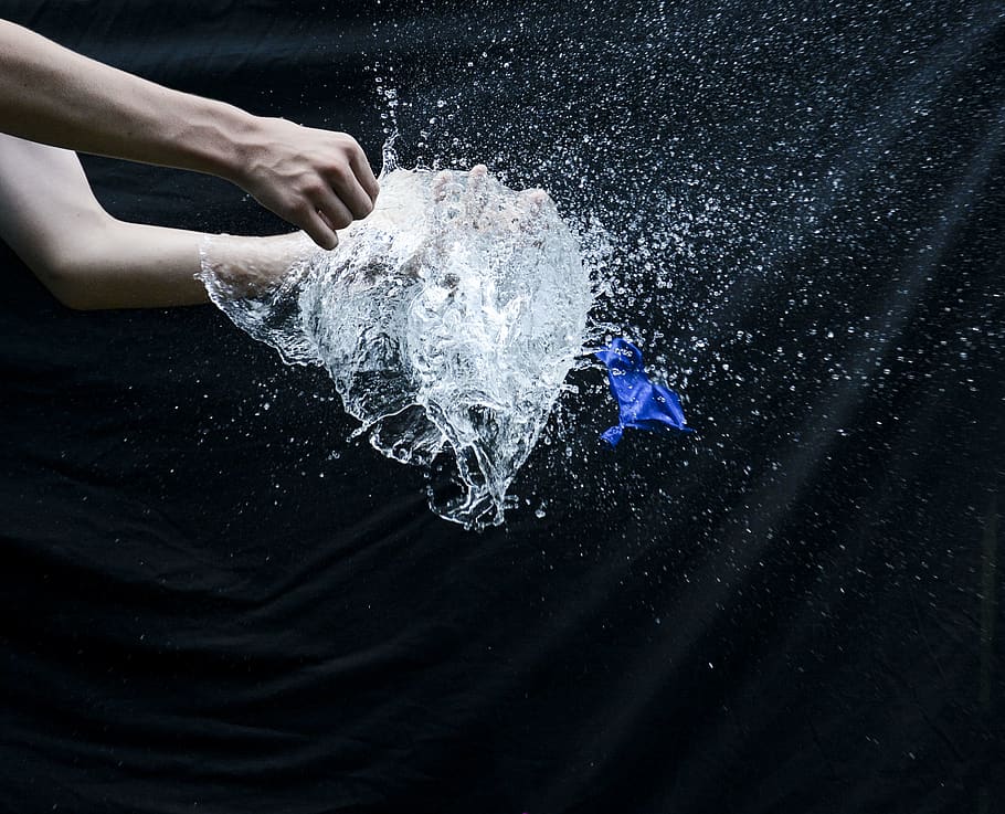 Time Lapse Photography Of Splash Of Water , balloon, hand, long-exposure HD wallpaper