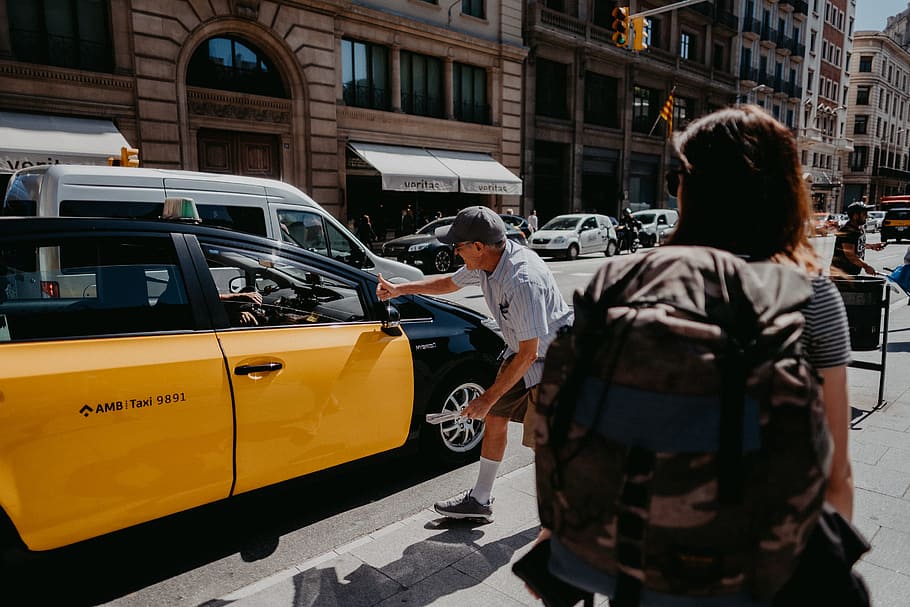 man near yellow and black car, street, cab, city, barcelona, travel, HD wallpaper