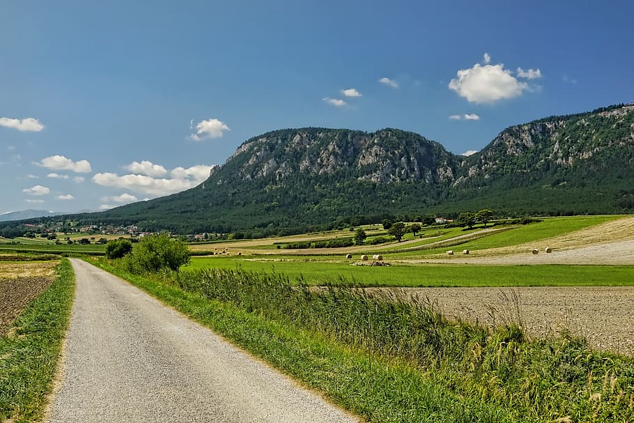 nature, landscape, high wall, clouds, mountains, trees, scenic HD wallpaper