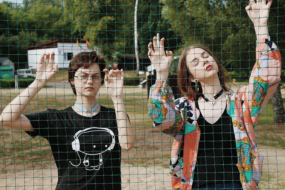 two women facing net, leisure activity, lifestyles, real people HD wallpaper